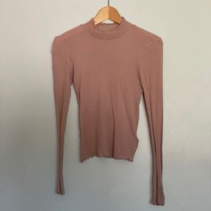 Cute pink frilly turtleneck top